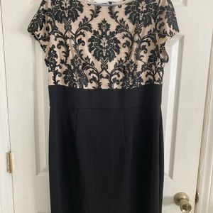 Black lace over a beige base